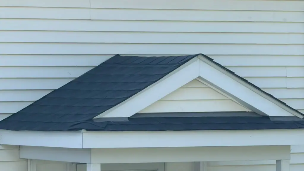 Small finished shingle roof over a white gable at the Chalfont home