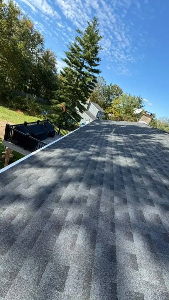Completed Charcoal shingles across the long Chalfont roof slope