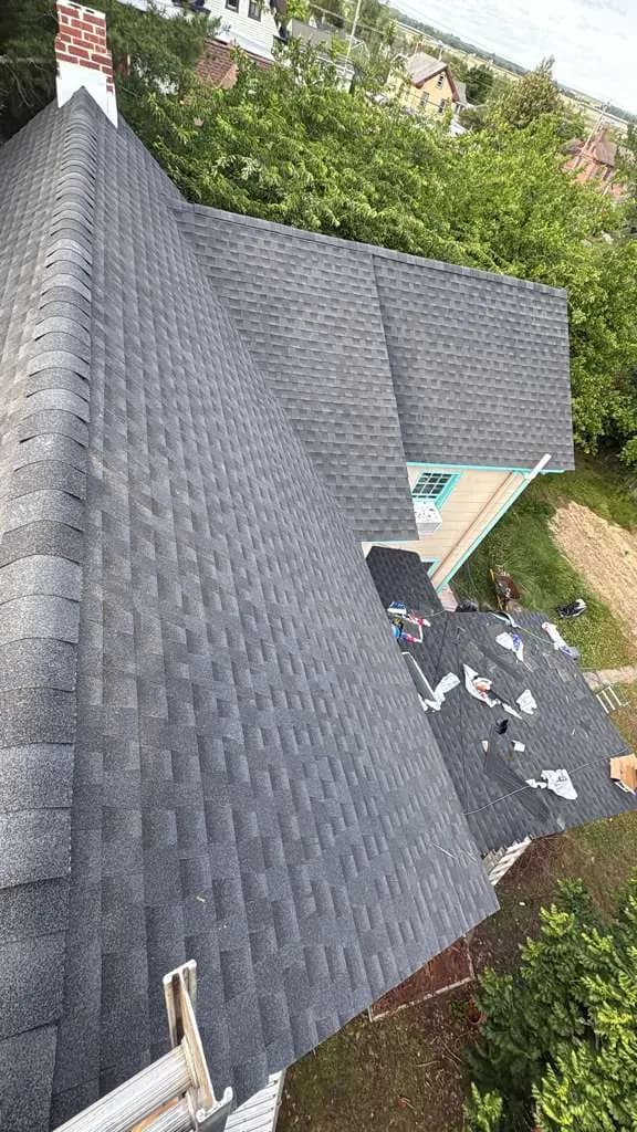Shingle installation across roof planes in Millville, New Jersey