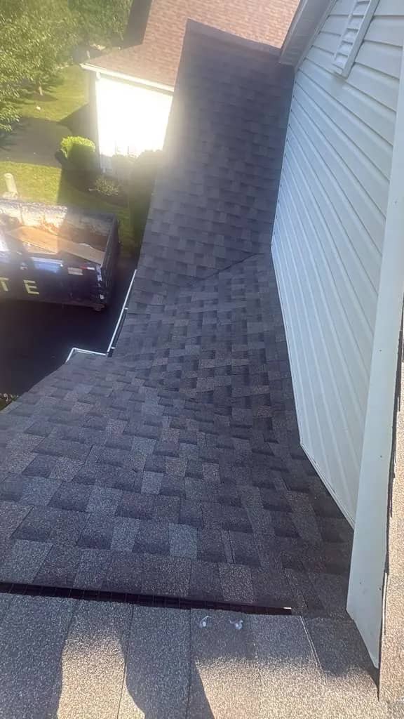 Completed shingle roof plane in Newark, Delaware