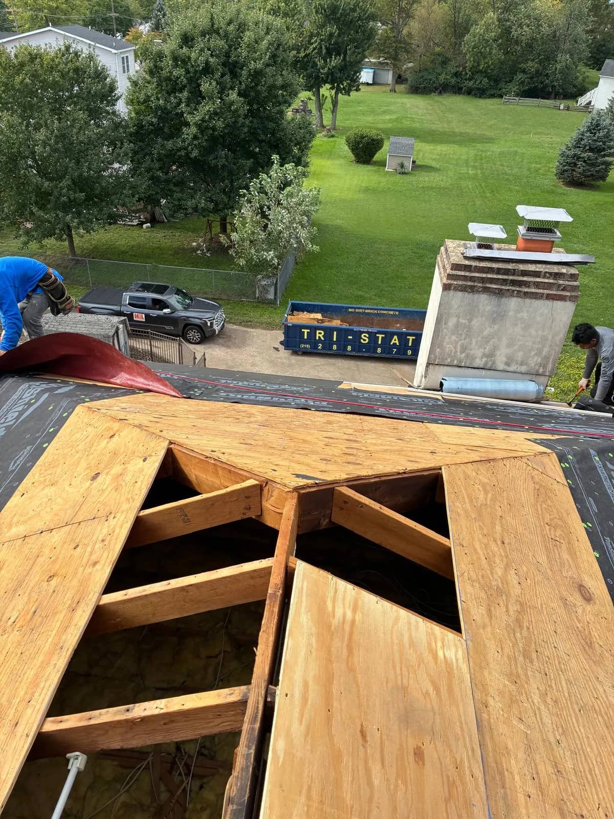 Roof framing and open decking sections during the Norristown replacement